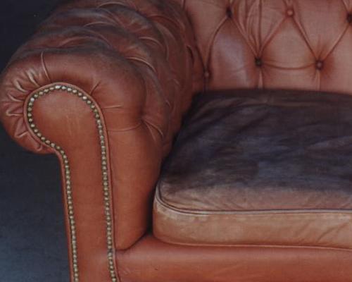 leather chesterfield couch before restoration