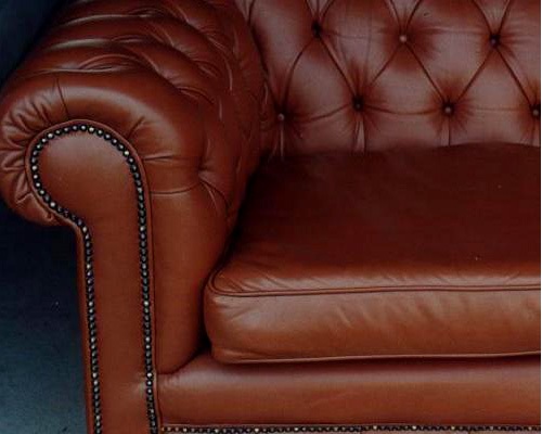 leather chesterfield couch after restoration