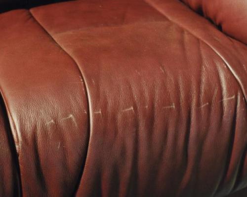 damaged leather couch