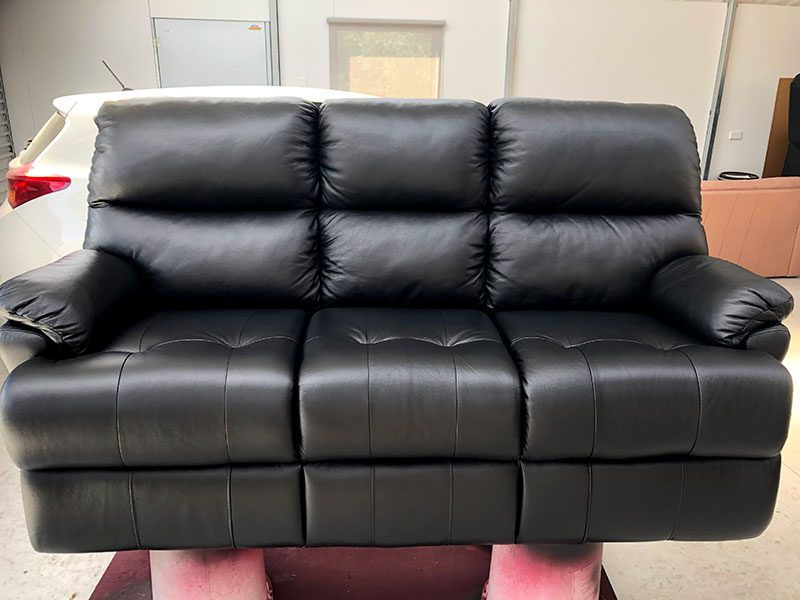 Black leather couch completely refinished