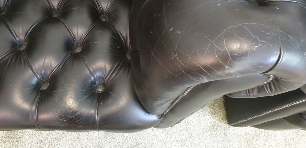 a close up showing the condition of the leather