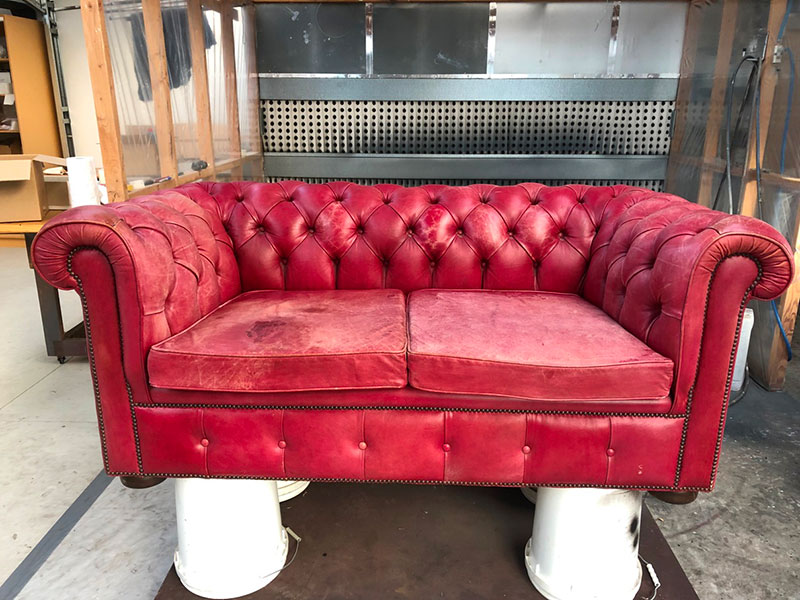 Red leather chesterfield couch needing to be recoloured